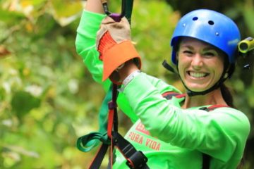 A girl in cloud forest zip line in Monteverde Costa Rica