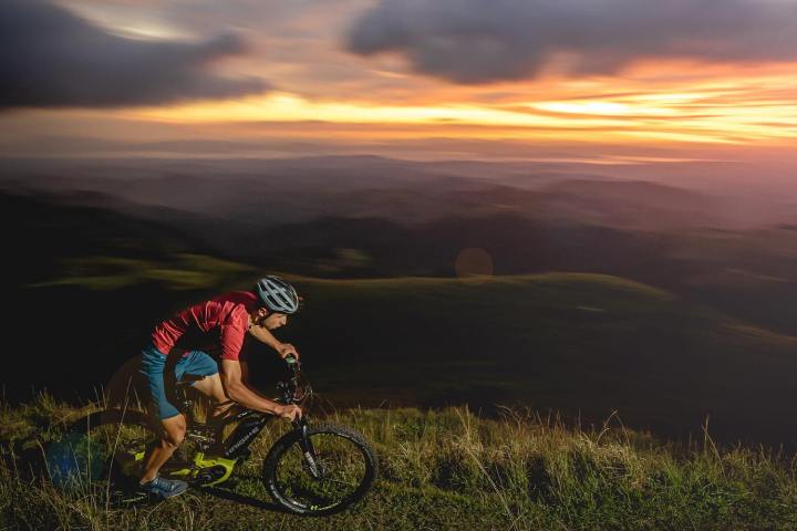 A tourist at the Epic Sunset Monteverde Mountain E-Bike Tour