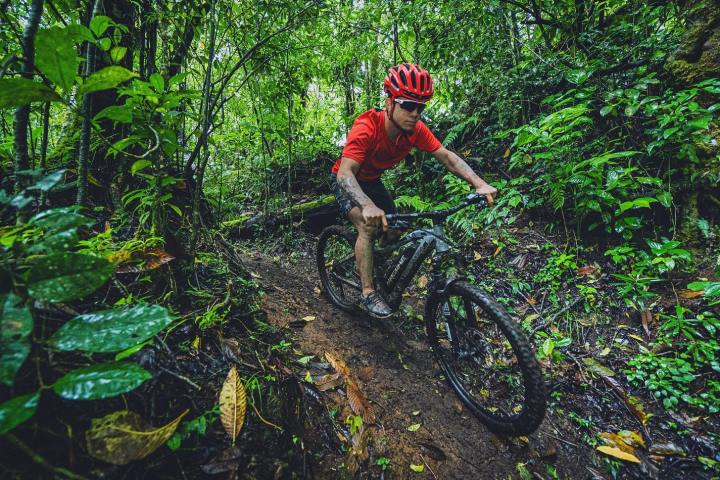A Tourist at The Cloud Forest Monteverde Mountain E-Bike Tour