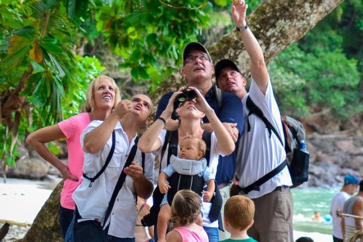 a group of people standing in front of a crowd